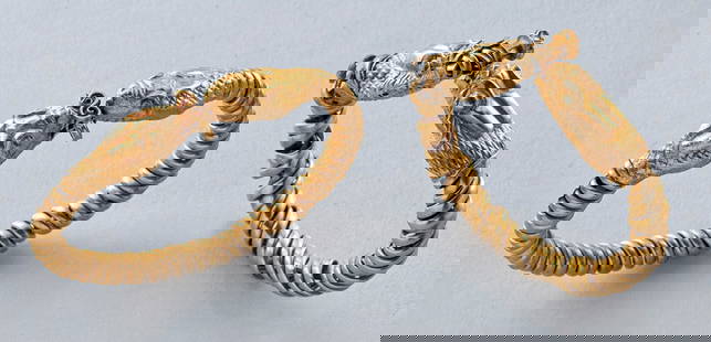 Published Ptolemaic Gold Bracelets Zoomorphic Terminals: Egypt, Ptolemaic Period, ca. 3rd to 1st century BCE. An exceptional pair of 22K+ gold bracelets from Ptolemaic Egypt, each crafted from thick, twisted gold wire and terminating in elaborately