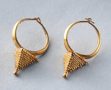 Ptolemaic Gold Earrings Granulated Pyramid Pendants: Egypt, Ptolemaic Period, ca. 3rd to 1st century BCE. A matched pair of exquisite gold earrings from the Ptolemaic era, each formed from high-karat gold into an elegant hoop surmounted by a finely