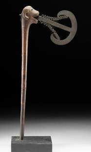 Benin Fon Prestige Ceremonial Axe w/ Animal Head: West Africa, Benin, Fon culture, ca. early to mid-20th century CE. A striking ceremonial prestige axe crafted from wood, iron, and brass. The broad crescent-shaped iron blade is mounted atop a wooden