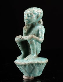 Egyptian Faience Amulet of Harpokrates on Lotus Flower