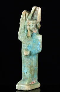 Egyptian Faience Amulet - Min w/ Erect Phallus: Egypt, Late Dynastic Period to Ptolemaic Period, ca. 664 to 30 BCE. A faience amulet charm depicting the deity Min (sometimes Khem), the god of fertility and reproduction, holding an erect phallus in