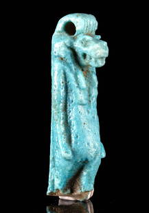 Ancient Egyptian Faience Tawaret Amulet, Hippo Goddess: Egypt, Late Dynastic Period to Ptolemaic Period, ca. 664 to 30 BCE. This mold-formed faience amulet depicts the goddess Taweret as a composite figure with the head of a hippopotamus and the body of a