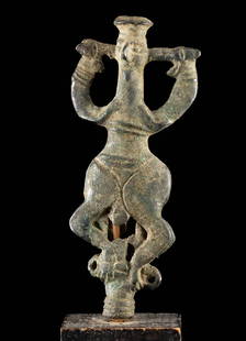 Luristan Bronze Master of Animals Finial: Ancient Near East, Northwestern Iran, Luristan, ca. 1200 to 800 BCE. An intriguing cast-bronze standard finial in the form known as the "master of animals." The composition depicts an abstract anthrop