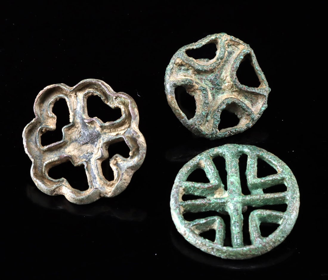 Three Bactria-Margiana Bronze Compartmented Seals: Central Asia, Afghanistan / Turkmenistan region, Bactria-Margiana (Oxus Civilization), Bronze Age, ca. 3000 to 1500 BCE. A group of three copper-alloy and bronze "compartmented" seals, each designed w