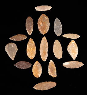 16 Moroccan Neolithic Knapped Chert Blades: Northwestern Africa, Morocco, Ain Leuh region, neolithic Period, ca. 8000 to 5000 years ago. A group of 16 bifacial flaked chert (flint) blades, allegedly collected from the Ain Leuh region. Such tool