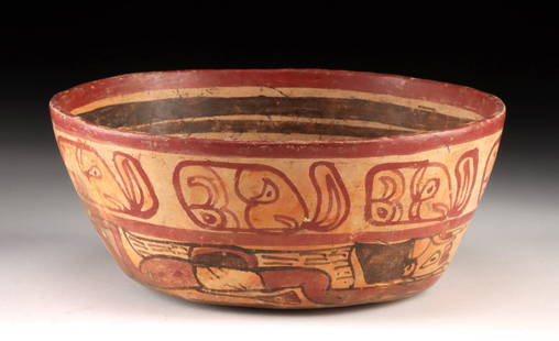 Maya Copador Pottery Swimmer Bowl - Pseudoglyphs: Pre-Columbian, Maya, Copador Style, ca. 600 to 900 CE.A visually arresting Maya Copador pottery bowl, painted in rich red and cream hues and encircled with vivid glyphic and figural decoration. The ve