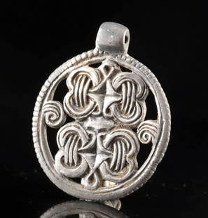 Viking Silver Pendant - Twinned Knotwork Motif: Northern Europe, Scandinavia, Viking, ca. 9th to 11th century CE. A refined and tactile piece of Norse ornamentation, this Viking silver pendant displays the distinctive openwork craftsmanship favored