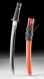 Japanese Tanto Sword in Koshirae with Red Lacquer Saya: East Asia, Japan, Showa era, ca. mid-20th century CE. A striking Japanese tanto sword in koshirae featuring a sleek, high-gloss red lacquered saya (scabbard) with black lacquer accents and a tightly b