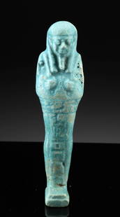 Egyptian Late Dynastic Faience Ushabti w/ Hieroglyphs: Egypt, Late Dynastic period, 27th to 31st Dynasty, ca. 525 to 332 BCE. A beautifully molded faience ushabti in luminous turquoise blue, embodying both the ritual and artistry of Egypt's Late Dynastic