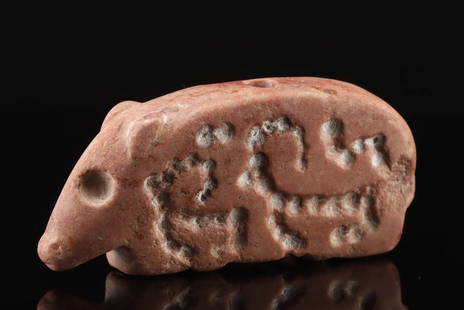 Sumerian Zoomorphic Stone Seal w/ Ibexes: Ancient Near East, Sumerian, ca. 3000 to 2500 BCE. A splendid stone seal masterfully carved into the form of a seated animal, perhaps a boar or pig, its legs neatly tucked beneath its sturdy form. Pie