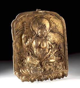 Tibetan Buddhist Copper Plaque of Jambhala & Mongoose: Central Asia, Himalayas, Tibet or Nepal, ca. 19th to early 20th century CE. A repousse copper devotional plaque depicting Jambhala, the Buddhist deity of wealth, prosperity, and abundance. Cast in hig