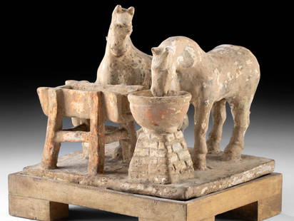 Chinese Han Dynasty Mingqi Pottery Horse Stable Scene: East Asia, China, Han Dynasty, ca. 206 BCE to 220 CE. A charming mingqi pottery tableau depicting two horses feeding at troughs - a classic stable or farmyard scene. Molded in buff earthenware with tr
