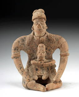Colima Terracotta Figure - Maternal Embrace (Mother & Child): Pre-Columbian, West Mexico, Colima, ca. 300 BCE to 300 CE. A tender image of maternal care rendered in ancient clay, this seated terracotta figure from Colima captures the timeless intimacy between mo