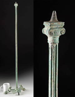 Roman Bronze Candelabrum - Fluted Shaft and Tripod Base: Roman, Imperial period, ca. 1st to 3rd century CE. A majestic Roman bronze candelabrum, cast in leaded bronze and rising with stately elegance to over three feet tall. The shaft is finely fluted and t