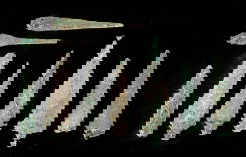 Group of 9 Canaanite Bronze Age Copper Spear Tips: Ancient Near East, Levant, Canaanite, Middle Bronze Age, ca. 1900 to 1550 BCE.A weathered and earthen chorus of war and ritual, this group of nine Canaanite copper spear tips evokes the martial splend
