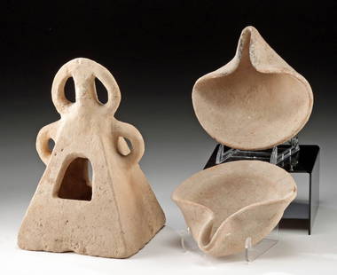 Iron Age Holy Land Pottery Oil Lamps & Censer Lid: Near East, Holy Land / Israel, Iron Age II, ca. 7th to 6th century BCE. A group of three hand-formed ceramic objects, including a pair of pottery oil lamps and a pyramidal censer or lantern cover. Eac