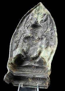 Rare 12th C. Khmer Bronze Mold of Seated Buddha: Southeast Asia, Cambodia, Khmer Empire, circa 12th to 13th century CE. A rare bronze mold, shaped like a lotus blossom, featuring a seated Buddha in full lotus position, embodying serene meditation. T
