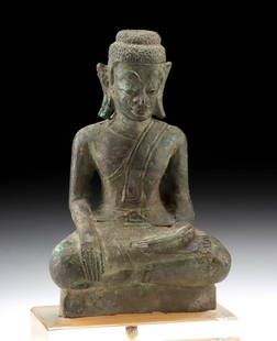 18th C. Laos Bronze Maravijaya Buddha w/ Bold Eyebrows: Southeast Asia, Laos, ca. 18th century or earlier CE. A finely cast bronze figure of the Buddha in Maravijaya (victory over Mara) posture, seated in full lotus with the right hand touching the earth i