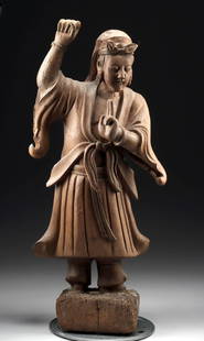 Consecrated 16th C. Chinese Wood Taoist Guardian Figure: East Asia, China, Ming to early Qing Dynasty, ca. 16th to 17th century CE. A finely carved wooden figure of a Taoist guardian, depicted standing atop an integral plinth and clad in flowing, layered ro