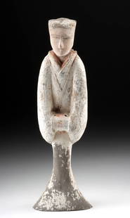 Han Dynasty Pottery Lady Attendant Funerary Figure: East Asia, China, Han Dynasty, ca. 206 BCE to 220 CE. A tall, slender pottery mingqi funerary figure, mold-made with voluminous sleeves and hands held together at the front, each perforated with small