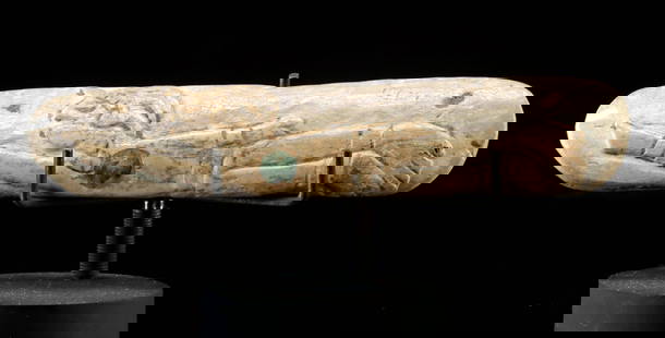 Maya Ritual Bone Implement Depicting a Flying Figure: Pre-Columbian, Guatemala and southern Mexico, Maya, Late Classic Period, ca. 550 to 900 CE. A fascinating carved bone panel depicting a horizontally oriented male figure with one arm outstretched, as