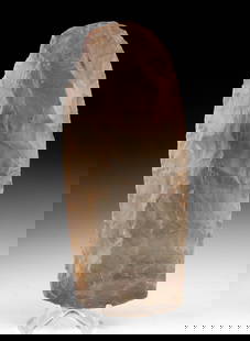 Neolithic North African Chert Axe - Large Hand Tool: North Africa, Neolithic period, ca. 8000 to 2000 BCE. A large, expertly flaked hand axe or utility blade, fashioned from dense, mottled chert in hues of taupe, reddish-brown, and gray. The tool featur