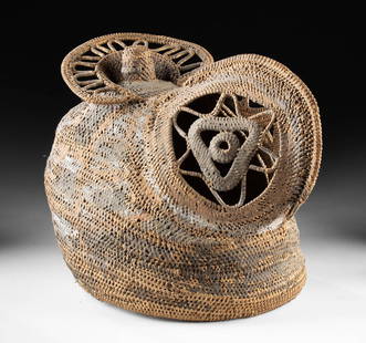 Papua New Guinea Woven Baba Tagwa Helmet Mask: Oceania, Papua New Guinea, East Sepik, Abelam, ca. early to mid-20th century CE. A baba tagwa helmet-style mask handwoven from plant fibers and reinforced with clay and earthen pigments, forming a bul