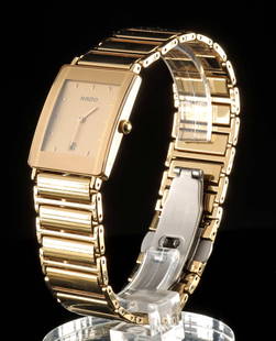 Rado DiaStar Gold-Toned Ceramic Luxury Wristwatch: Western Europe, Switzerland, ca. 21st century CE. A Rado DiaStar quartz movement wristwatch, featuring a gold-toned ceramic bracelet and bezel. The watch is equipped with a sapphire crystal, offering