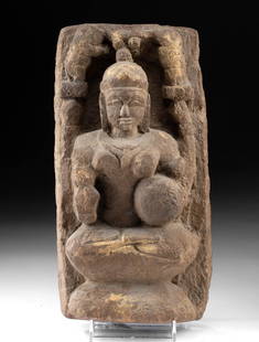18th C. Indian Sandstone Panel of Deity Gajalakshmi: South Asia, India, ca. 18th century CE. A sandstone panel depicting a female deity in high relief, seated in full lotus with implements in her hands. Her head is framed by rearing animals, possibly el
