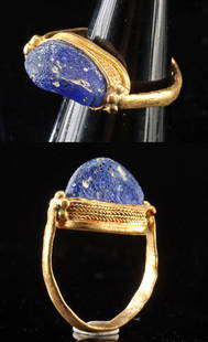 Roman Gold Ring - Blue Glass Cabochon & Filigree: Roman, Imperial, Eastern Mediterranean, ca. 3rd to 4th century CE. A refined example of late Roman luxury, this high-karat gold ring showcases the technical precision and aesthetic sophistication of e