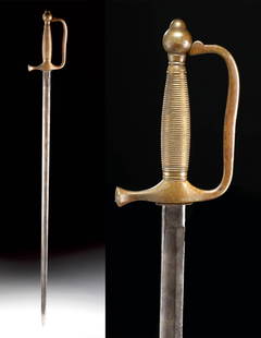 1863 US Civil War Sword by C. Roby Chelmsford Mass.: North America, United States, Massachusetts, Civil War Era, ca. 1863 CE. An original Civil War period Model 1840 Musicians' sword, featuring an iron blade and brass hilt assembly. The blade is blunt a