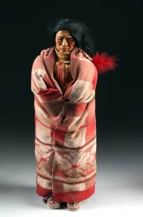 1980s Large Native American Doll, ex- Liza Minnelli: North America, United States, ca. 1989 CE. A toddler-sized figure created in the style of early 20th-century Skookum dolls, though produced long after original Skookum doll production ceased. The figu