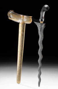 Indonesian Kris Sword w/ Topaz, Garnets & Brass Sheath: Southeast Asia, Indonesia, ca. 20th century CE. A finely crafted kris sword with a serpentine forged-steel blade exhibiting the distinctive wavy profile characteristic of this revered weapon. The blad