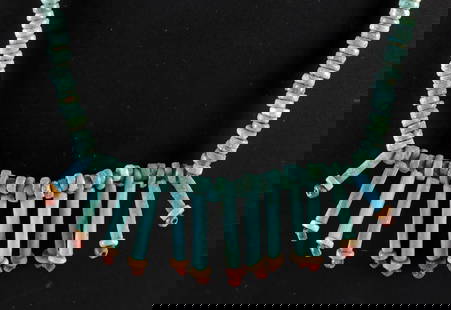 Lovely Ancient Egyptian Faience Beadwork Necklace: Egypt, New Kingdom to Late Dynastic periods, ca. 1550 to 332 BCE. A beautiful necklace composed of ancient Egyptian faience beads. The strand is arranged with turquoise-hued seed beads that run along