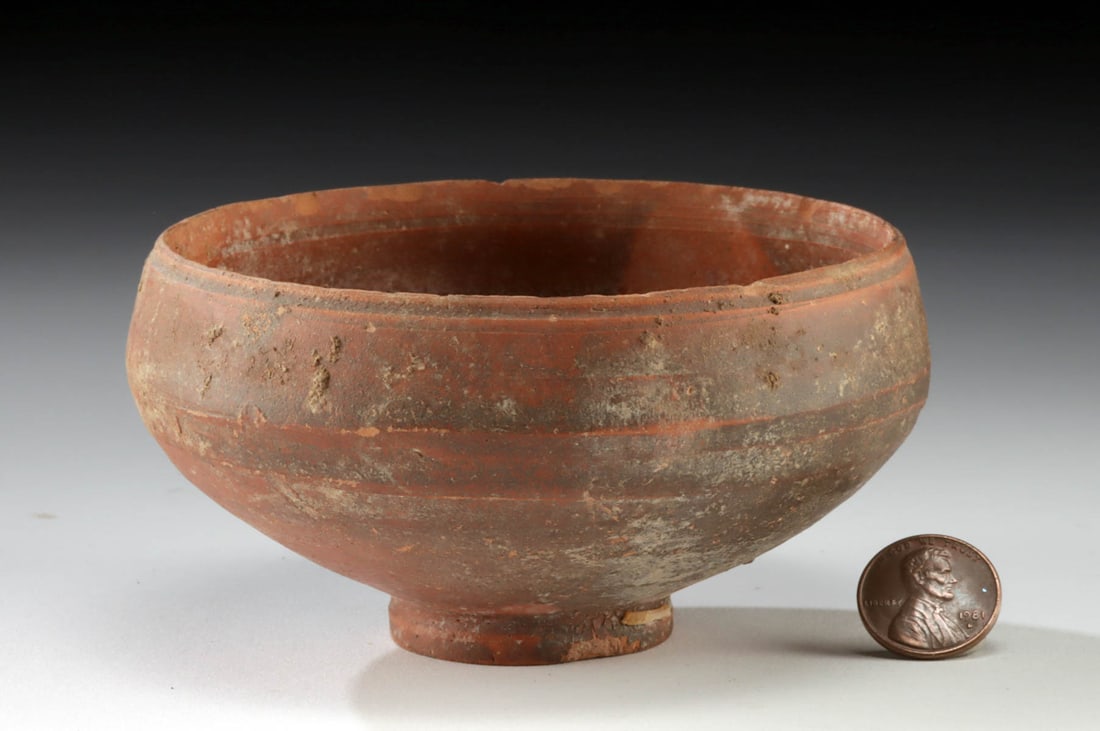 Roman Redware Bowl - Pompeii Type: Roman, early Imperial period, ca. 1st century CE. A red-slipped terracotta bowl from the Roman world, this modest vessel reflects a form found at Pompeii, the city buried by Vesuvius in A.D. 79. Shape