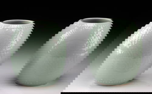 Two Chinese Celadon Porcelain Vases, Phoenix Patterns: **Originally Listed At $100** East Asia, China, mid-20th century CE. A pair of matching celadon-glazed porcelain vases, each formed in an elegant egg shape with a wide, open mouth. The bodies are deco