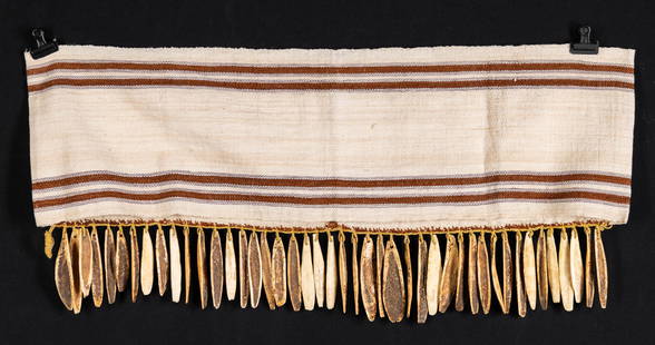 Amazonian Shipibo Baby Sling w/ Bone Fringe: **Originally Listed At $500** South America, Peru / Brazil, Amazon basin, Ashaninka or Shipibo-Conibo culture, ca. mid to late 20th century CE. A woven cotton sling with an incised bone fringe that wa