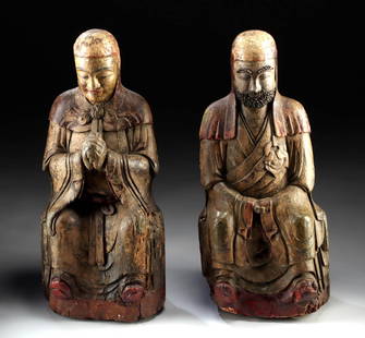 Pair of Chinese Ming Wooden Lohan Figures: East Asia, China, Ming Dynasty, ca. 1368 to 1644 CE. From the mists of the Ming Dynasty arose these two wooden Lohan figures, silent witnesses to centuries past. Fashioned, it seems, by a singular han