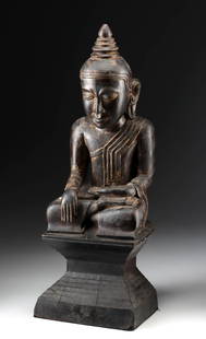 18th C. Burmese Shan Lacquer Wood Buddha, Trace Gilding: Southeast Asia, Burma (Myanmar), ca. 18th century CE. Behold this impressive Buddha, a Shan-style sculpture crafted from lacquered wood with the lingering shimmer of past gilding. Seated in padmasana,