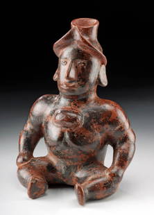 Colima Pottery Seated Dwarf Shaman Vessel: Pre-Columbian, West Mexico, Colima, ca. 300 BCE to 300 CE. A pottery figure of a person with a severe hunchback and dwarfism. The face is sensitively modeled and largely realistic, with a long, straig