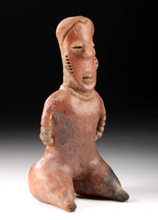 Ancient West Mexico Nayarit Pottery Funerary Figure: Pre-Columbian, West Mexico, Nayarit culture, ca. 300 BCE to 300 CE. A hand-built and burnished redware pottery seated figure, likely created to be placed in a shaft tomb as a ceremonial companion, gua