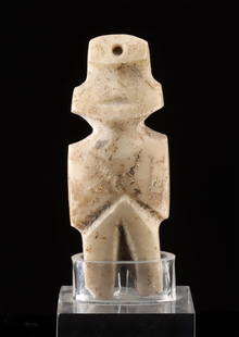Guerrero / Mezcala Stone Pendant, Axe God Form: Pre-Columbian, West Mexico, Guerrero, Mezcala culture, ca. 300 to 100 BCE. A striking pendant in the form of the so-called "axe god," this stone figure embodies the spiritual minimalism of Mezcala art
