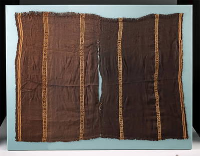 Early Peruvian Quechua Woven Wool Poncho: South America, Peru, Quechua culture, 19th to early 20th century CE. A woven wool poncho composed of two dark brown rectangular panels joined along the center seam, with a vertical slit left open for