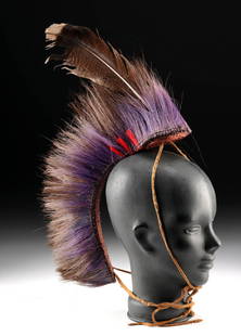 Native American Porcupine Roach Headdress + Feather: Native American, Western United States, Plains region, ca. 20th century. A roach headdress composed primarily of porcupine guard hairs, accented with dyed horsehair and a large turkey feather. The cor