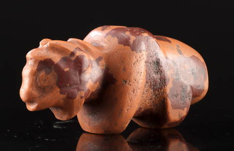 Rare 19th C. Sioux Pipestone Bison Club Head: Native American, Western United States, Plains Tribes, Lakota / Dakota (Sioux), ca. mid to late 19th century CE. A rare carved effigy of a buffalo, sculpted from warm-toned catlinite (pipestone), like