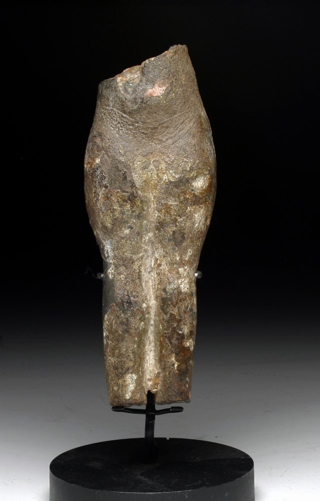 An Egyptian Bronze Torso of a Concubine: From ancient Egypt, Late Period, ca 600 to 300 BC. Solid bronze lower torso of a female concubine showing incised pubis. Custom stand. Torso itself measures 3-3/8"H, Provenance: Ex-private New England