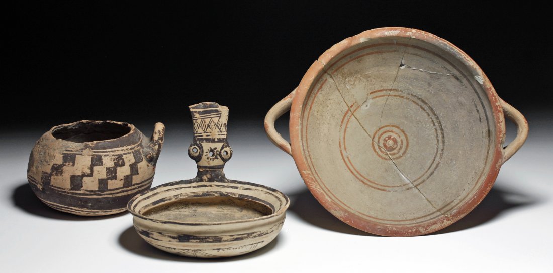 Three Daunian Pottery Items - All Published: Southeastern Italy, Ca 4th century BCE. Set of 3 pottery vessels uncovered in a Daunian tomb in 1944 by Byron Farwell, and later (1953) published in a book on his collection. First, a small handled ja