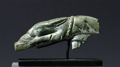 A Roman Bronze Rabbit: Rome, ca. 200 CE. Solid bronze rabbit lunging at something, possibly a mouse. Great action and workmanship, possibly from a larger vase or a knife handle. Length: 3 1/2" (9 cm.) Provenance: Ex Private