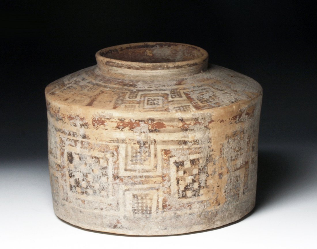 An Indus Vallery Pottery Pyxis: Pakistan, Indus Valley, Ca 3rd millennium BCE. Nice pottery pyxis painted in brown and red pigment in varied geometric shaped. 3" (7.5cm) H by 3-5/8" (9.3cm) D. Provenance: Ex- Smith collection Authen