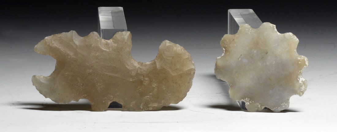 A Set of 2 Mayan Eccentric Flints: Pre-Columbian, Mayan Territories, Ca. 500-900 CE. Excellently knapped flint stones, each carved in the shape of an insect or object. First, a finely designed scorpion, with twin pinchers and long coil